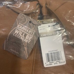 Brand new Carhartt loose fit, firm Duck insulated, flannel lined active jacket.